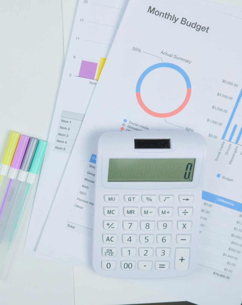 money tracking with paper and calculator