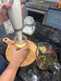 blending homemade avocado oil mayonnaise