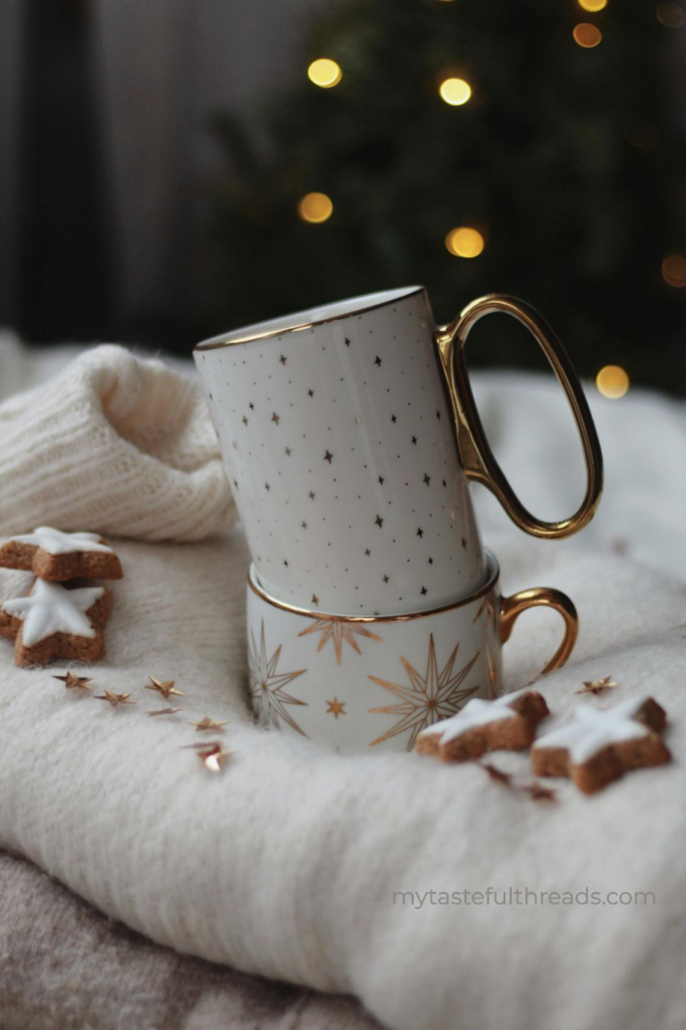 Cozy mug and soft blanket on a wooden surface - warm winter gift inspiration.