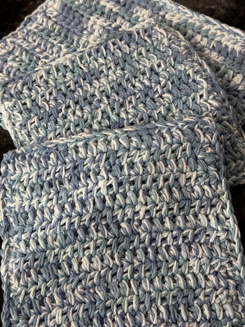 Thick crochet hot pad made with dense cotton stitches for kitchen use