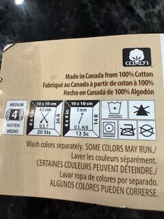 yarn label wrapper indicating the cotton fiber so you can understand what the yarn is made from.