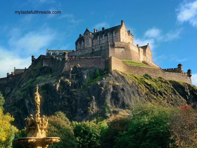 Edinburgh Castle on a hill overlooking the city in Scotland.
