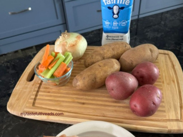 Fresh pantry staples including potatoes and milk on a cutting board for budget meal planning