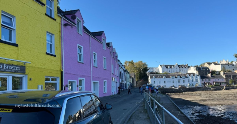 colorful painted buildings along Portree harbour Isle of Skye Scotland