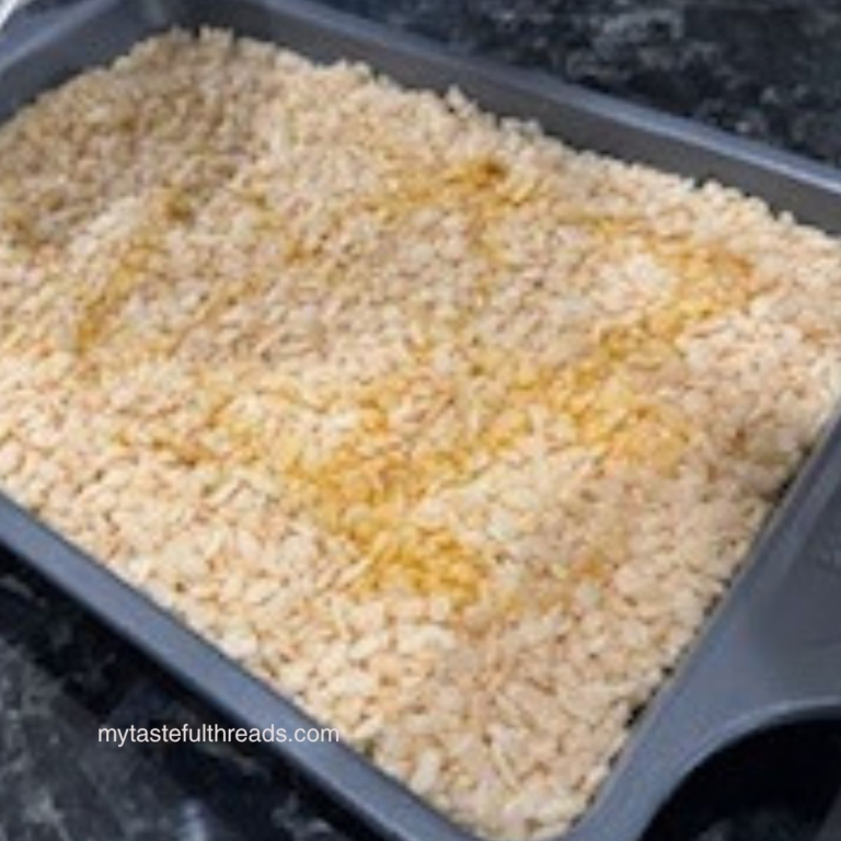 Rice Krispie chicken casserole in a baking pan with crispy topping