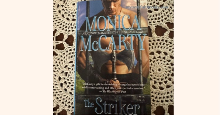 The Striker by Monica McCarty book on lace tablecloth — Highland Guard Book 10 review