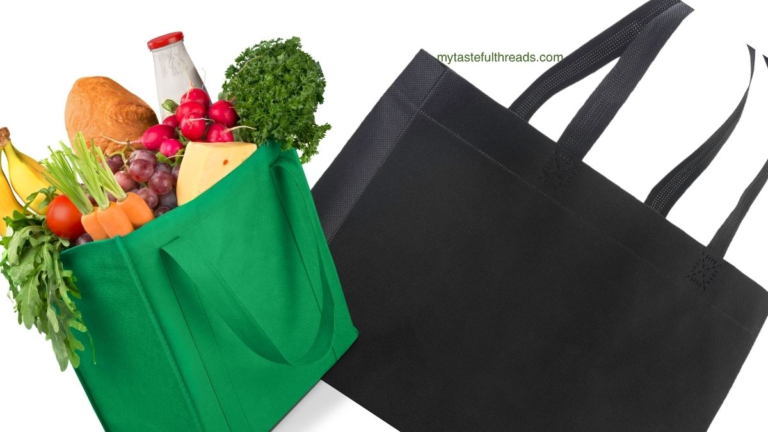 Green structured reusable grocery bag filled with groceries next to a black canvas reusable tote bag