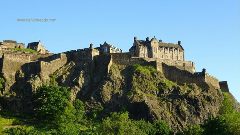 Edinburgh Castle on its rocky cliff, backdrop for The Rock, Highland Guard Book 11 by Monica McCarty